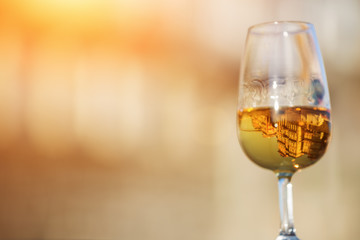Reflection of Porto city in a white wine glass,Copy space, shallow doff, soft focus