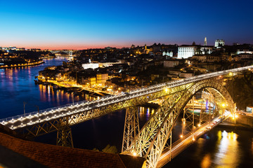 Naklejka na ściany i meble Bridge of Luis I at night over Douro river and Porto cityscape, Portugal