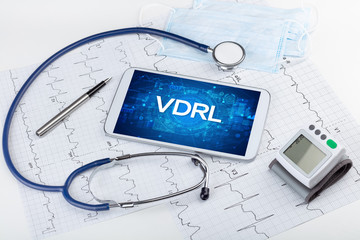 Close-up view of a tablet pc with VDRL abbreviation, medical concept