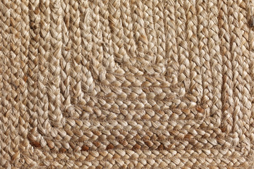 Smooth texture at the bottom of wicker straw basket. extreme closeup of a vintage wicker texture.