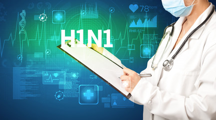 young doctor writing down notes with H1N1 inscription, healthcare concept