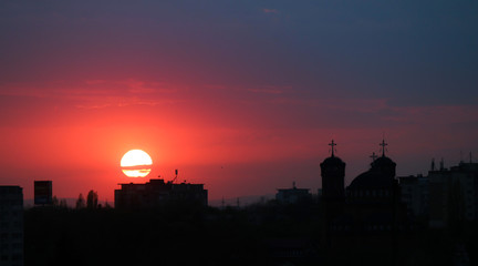 Beautiful sunset above the city skyline  , The city of Ploiesti, Romania with a beautiful sun