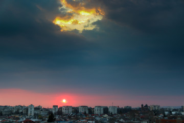 Beautiful sunset above the city skyline  , The city of Ploiesti, Romania with a beautiful sun