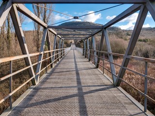 Bridge over the Zadorra river at the Ullibarri-Gamboa Reservoir near the concrete dam