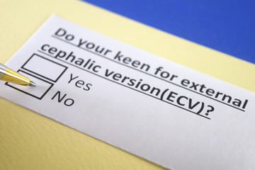One person is answering question about  external cephalic version.