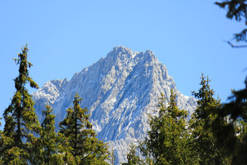 Beautiful mountain peak covered with snow  with blue sky