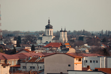 Fototapeta premium Old city buildings in the dusk , The city of Ploiesti , Romania in the golden light