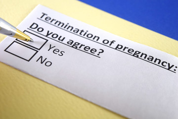 One person is answering question about termination of pregnancy.