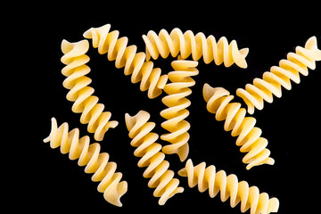 fusili pasta isolated on a black or white background