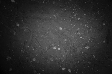 dark background with light on an empty countertop.
