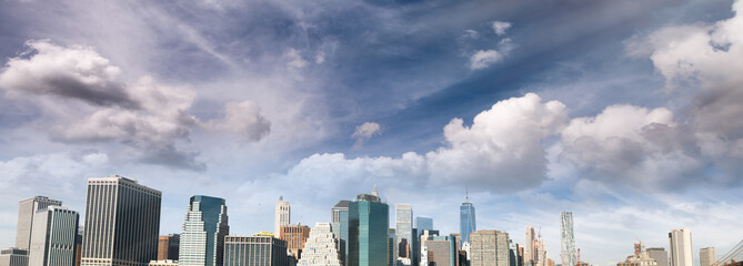 Panoramic view of Downtown Manhattan buildings and skyscapers. View from Brooklyn Bridge Park, New York City, USA