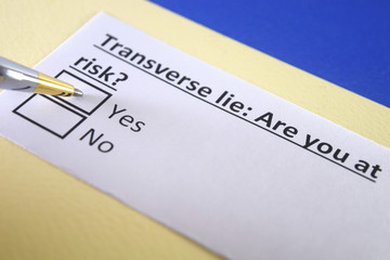 Fototapeta premium One person is answering question about transverse lie.
