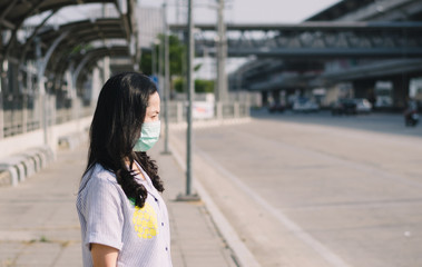People wearing mask to protect against viruses and dust in the city.