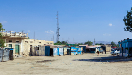 Fototapeta na wymiar Berbera, Somaliland - November 10, 2019: Looks like Crushed Streets and Buildings in the Berbera City