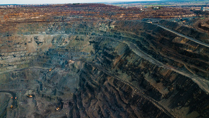 Aerial view of the Iron ore mining, Panorama of an open-cast mine extracting iron ore, preparing for blasting in a quarry mining iron ore, Explosive works on open pit