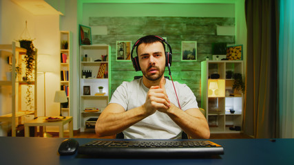 Pov of young man putting his headphones - obrazy, fototapety, plakaty