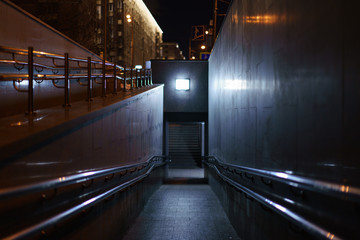 Futuristic ramp for sedentary groups of population. Underground pedestrian crossing ramp....