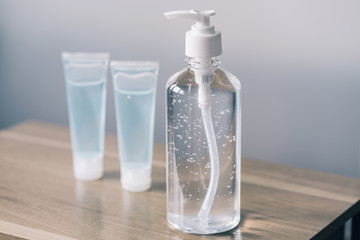 Hand sanitizer alcohol gel Anti virus protection with standard to prevent coronavirus COVID-19 infection.Medical protective on wood background.Healthcare and medical concept.