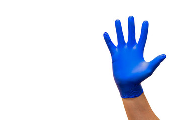 Closeup of a male hand in a blue medical glove showing a hello on a white background.