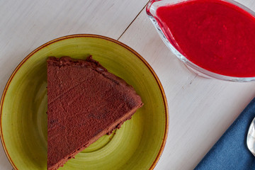 truffle cake with raspberry coulis