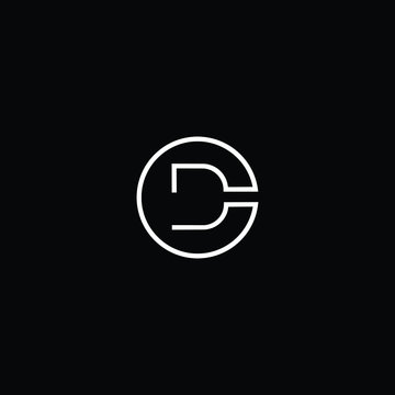Minimal elegant monogram art logo. Outstanding professional trendy awesome artistic CD DC initial based Alphabet icon logo. Premium Business logo White color on black background