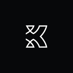 Minimal elegant monogram art logo. Outstanding professional trendy awesome artistic X XX initial based Alphabet icon logo. Premium Business logo White color on black background