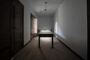 empty room with a window in the dark