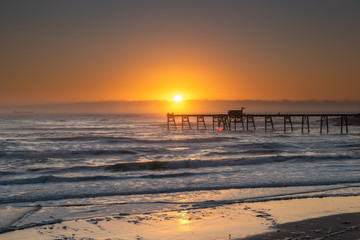 Naklejka premium Sunrise Seascape and Sea Foam