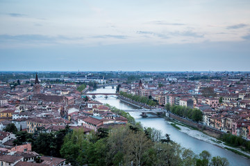 Fototapeta na wymiar View of the evening Verona from the observation deck at the Castle of St. Peter. Verona, Veneto, Italy