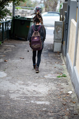 young woman walking on the street