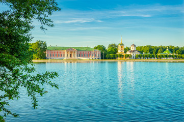 Kuskovsky Park, pond and Kuskovsky Palace at sunset. The estate of the Sheremetev family was built in 1769-1775. The Museum in Kuskovo.