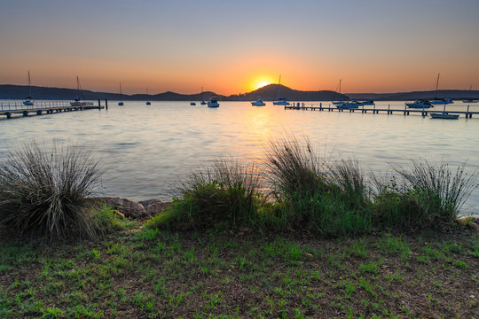 Sunrise and a light haze over the Bay