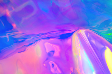 Blurred texture in violet, pink and mint colors. Abstract trendy holographic background in 80s...