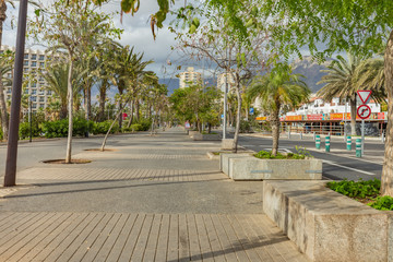 Las Americas,Tenerife, Spain March 21, 2020: Quiet, deserted streets of the most popular and crowded tourist resort in the Canary Islands. Isolation regimen during a coronavirus Covid-19 pandemic