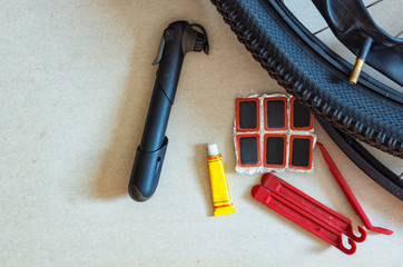 Tools for repairing punctured bicycle chambers