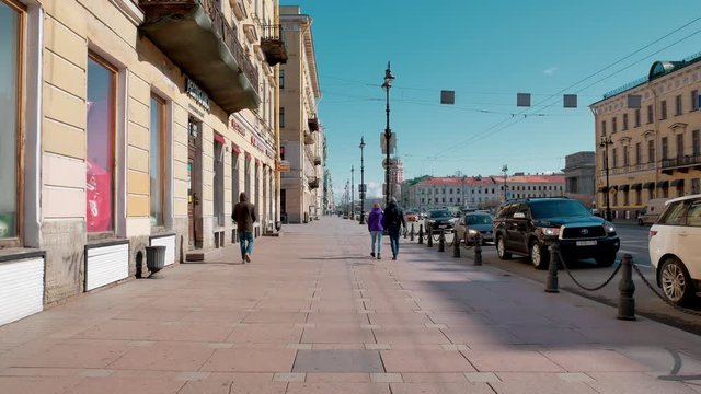 st. petersburg, russia. April 2020: walkside of nevsky avenue dith few people during covid isolation