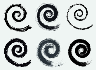 Black grunge spiral shapes.
