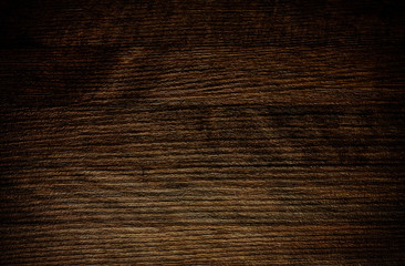 Obraz premium Wooden dark brown grungy background - wood texture