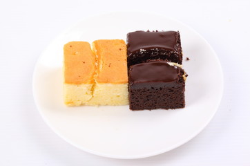 Brown cake and Chocolate cake on white background