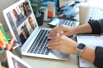 Young woman works from home during self isolation and quarantine. Work online and stay at home. Coronavirus outbreak, flu epidemic and covid-19.