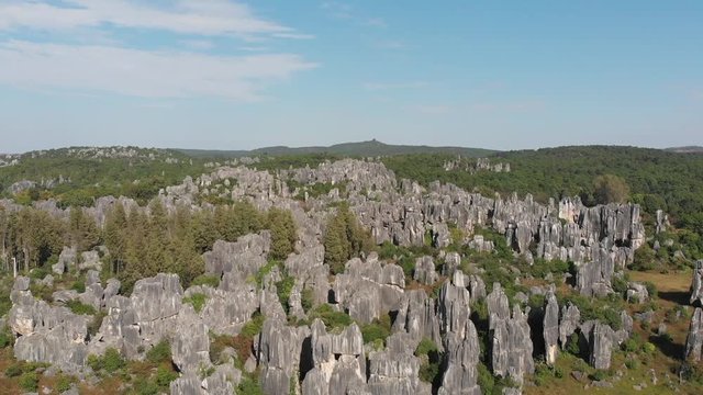 Aerial ascending above the Stone Forest of Shilin, at Kunming southern China