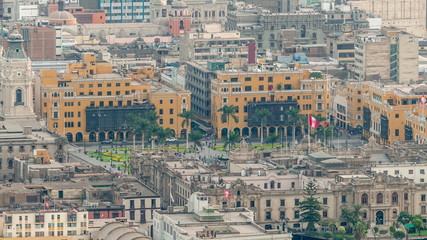 Aerial top view of Lima main square from San Cristobal hill timelapse, government palace of Peru and cathedral church.