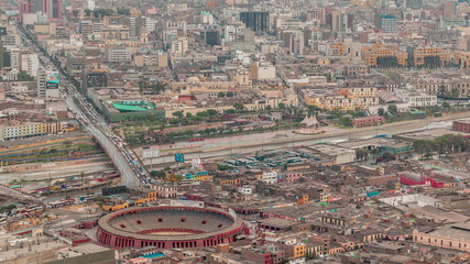 Aerial view of Lima skyline timelapse with Plaza de Toros de Acho bullring from San Cristobal hill.