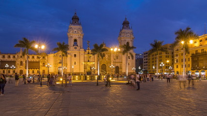 Fototapeta na wymiar Fountain on The Plaza de Armas day to night timelapse, also known as the Plaza Mayor