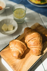 Fresh baked croissants on a plate