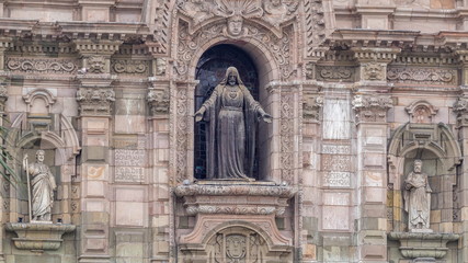 Staue on The Basilica Cathedral of Lima is a Roman Catholic cathedral located in the Plaza Mayor timelapse hyperlapse in Lima, Peru