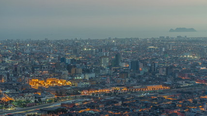 Aerial view of Lima skyline day to night timelapse from San Cristobal hill.