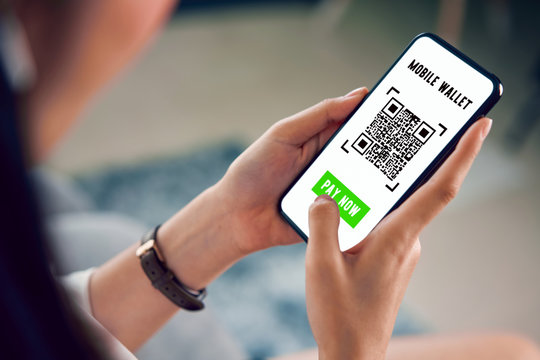 Woman using smartphone for qr code payment mobile banking on application wallet. - Powered by Adobe