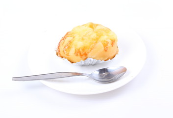 Bread on white plate on white background
