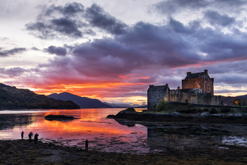 Fototapeta premium Eilean Donan Castle during colourful sunset - Dornie, Scotland - United Kingdom.